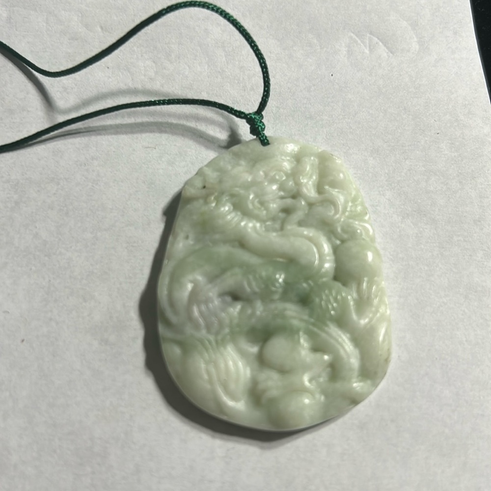White jade dragon pendant